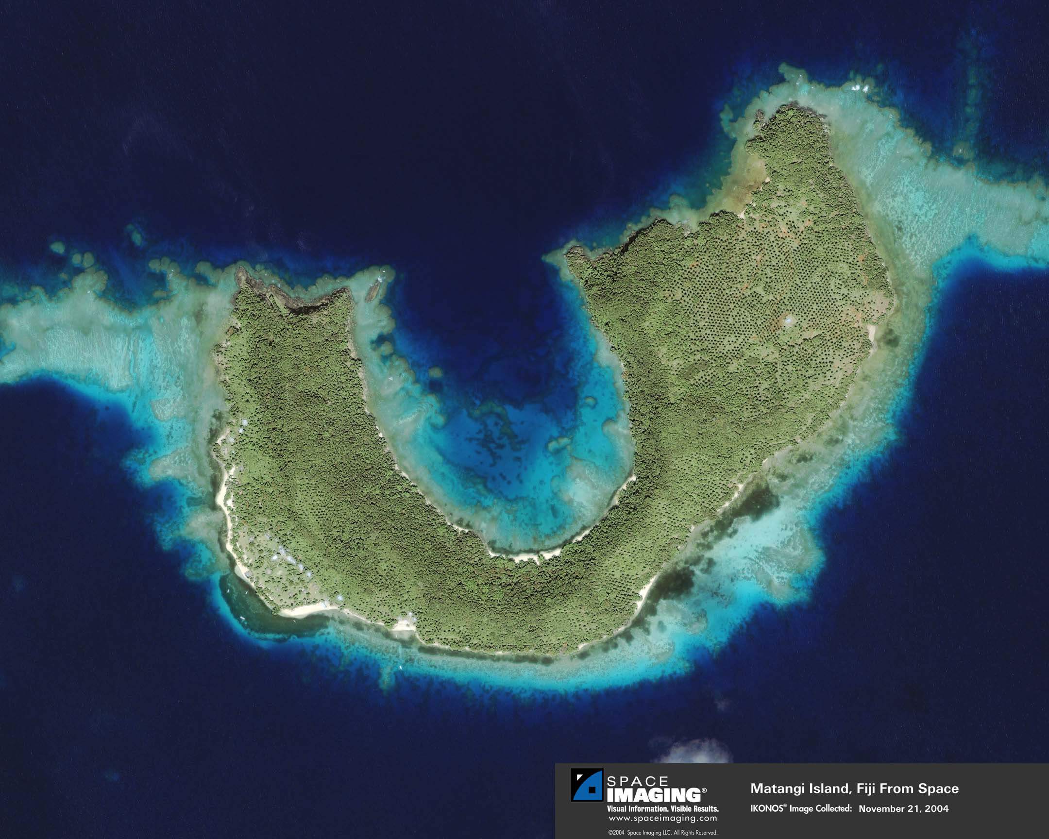 Matangi Island (Fiji), umgeben von Korallenriffen